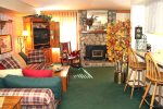 Mammoth Lakes Condo Rental Sunshine Village 113 - Living Room with Woodstove